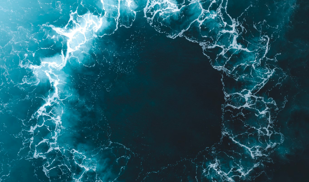 Incredible Ocean photo. Waves of the Ocean are in a spiral formation.